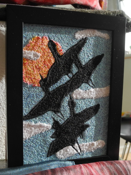 upcycled image from fabric leftovers cranes flying